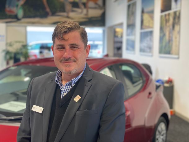 Blair in the showroom of Bowater Toyota